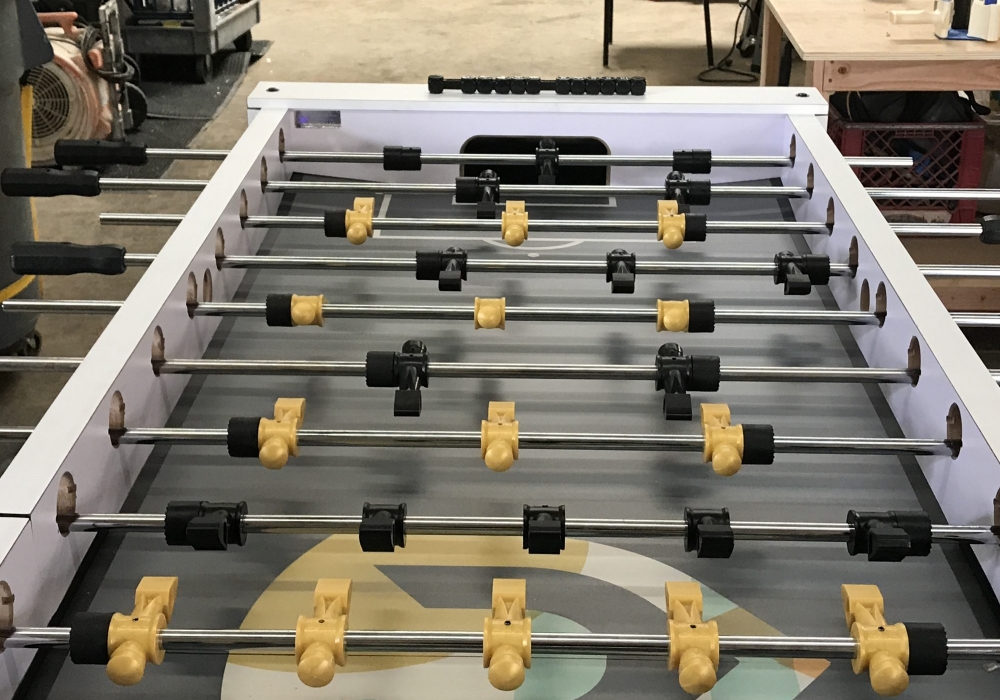 Multi-player foosball table custom built for Hollis Brand Culture
